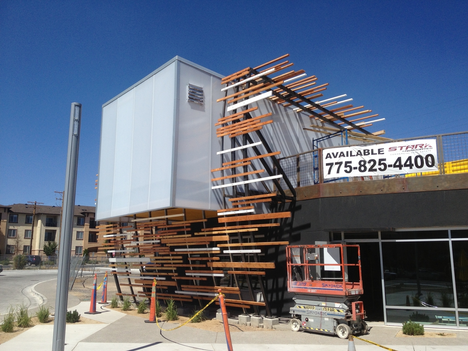 Vertical Steel Trellis With Wood On Store Front