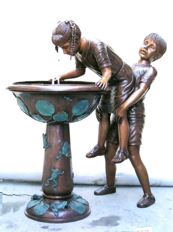 Bronze Garden Fountain, of a boy giving his sister a boost