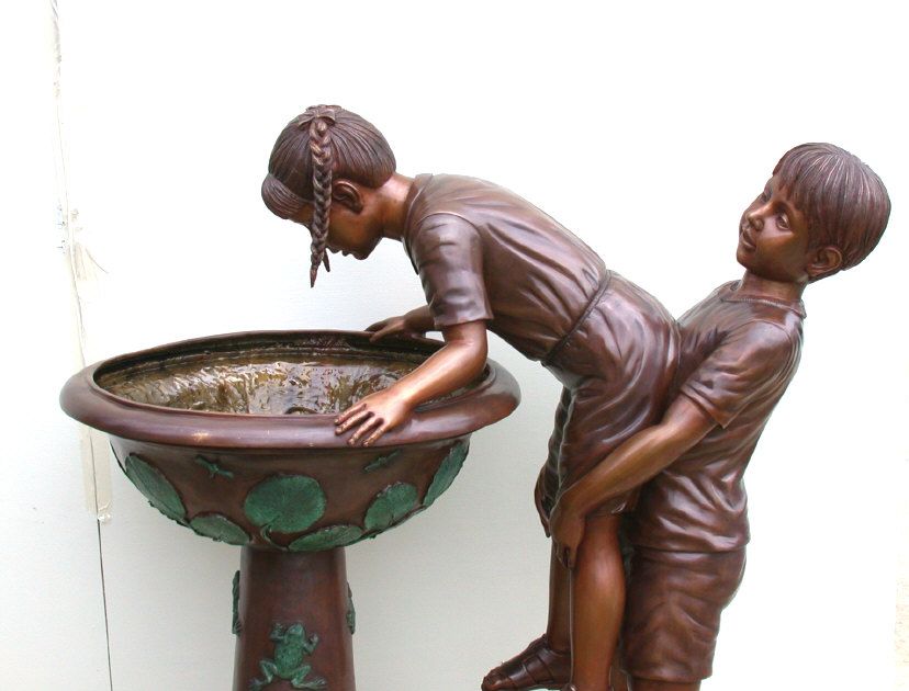 Bronze Garden Fountain, of a boy giving his sister a boost 2 