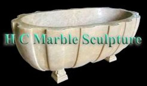 Oval marble bathtub w/ chanel design