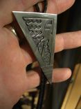 Bolo Sun Sawed In Half With Prayer Feathers 1 small
