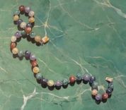 Trompe L'Oeil Bead Necklace Painted On Faux Marble Table Surface. 4 small