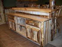 Custom Refinished Basement With Log Bar, Bar Stools And Wood Work 2 small