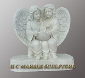 Memorial Statue of 2 Angels / Represents 2 daughter's who died in a car accident to be buried together.  1 small