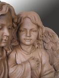 Memorial Statue of 2 Angels / Represents 2 daughter's who died in a car accident to be buried together.  4 small