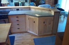 Kitchen Cabinets In Maple With Live-Edge Bookshelves 3 small