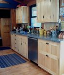 Kitchen Cabinets In Maple With Live-Edge Bookshelves 4 small