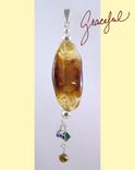 Organically Transparent Amber Pendant With Dangles On A Beadhopper 2 small