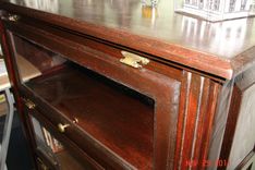 Glass Door Traditional Style Bookshelf / Mahogany Finish And Raised Panel Sides 3 small