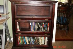 Glass Door Traditional Style Bookshelf / Mahogany Finish And Raised Panel Sides 5 small