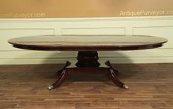 American Made Round Mahogany Dining Table With Leaves 1 small
