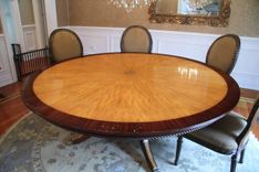 American Made Satinwood And Mahogany 84 Inch Round Pedestal Dining Table 1 small