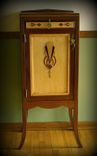 A Sheet Music Cabinet With Art Deco Styling And Details 1 small