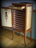 A Sheet Music Cabinet With Art Deco Styling And Details 2 small