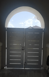 Contemporary Dual Entry Metal Gate with Horizontal slits and privacy #2088 R. O. width 72" by 72" H 2 small