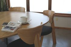 Parabola-Shaped Oak Table With Ebonized Base 3 small
