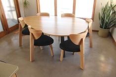Parabola-Shaped Oak Table With Ebonized Base 4 small