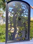 Children climbing over a tree Metal Gate #2920 R. O. width 36" by 60" H 2 small