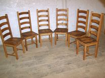 Wormy Chestnut Dining Chairs With Arched And Contoured Slats 2 small