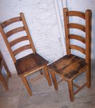 Wormy Chestnut Dining Chairs With Arched And Contoured Slats 3 small