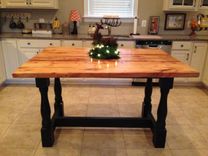 Harvest Style Kitchen Island Made From Reclaimed Hardwood With Turned Legs Base 1 small