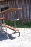 Industrial Styled Bar Height Table With A Metal Pipe Base And Salvaged Wood Planks Top 2 small