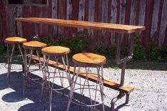 Industrial Styled Bar Height Table With A Metal Pipe Base And Salvaged Wood Planks Top 3 small