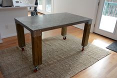 Douglas Metal And Wood Table With Wheels 3 small