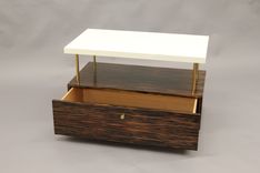 Macassar Ebony, Parchment And Brass Nightstand. 3 small