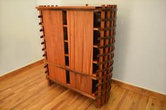 Stereo Cabinet Featuring Bent African Ribbon Sapele 4 small