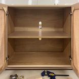 Coastal Charm White Oak Media Center With Rattan Doors 3 small