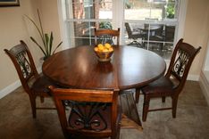 Walnut Round Table With Pedestal (Chairs Not Included) 3 small