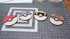 Four Wooden Pokeballs 1 small