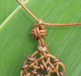 Necklace And Pendant: Circle Of Life Knot In Brown With Copper Beads 4 small