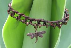 Necklace / Choker:  Brown Braided Leather Cord With Copper Beads And Pendant 4 small