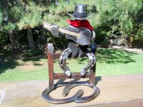 Horseshoe Cowboy Sculpture. 1 small