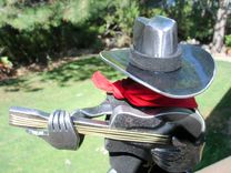 Horseshoe Cowboy Sculpture. 2 small