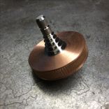 1.25" Diameter Copper And Titanium Spinning Top 1 small