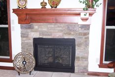 Custom Fireplace Mantel- Main Level & Custom Fireplace Surround Lower Level 1 small