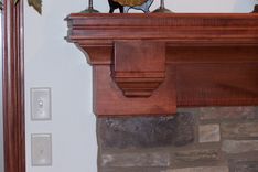 Custom Fireplace Mantel- Main Level & Custom Fireplace Surround Lower Level 2 small