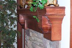 Custom Fireplace Mantel- Main Level & Custom Fireplace Surround Lower Level 3 small