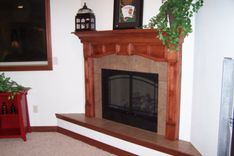 Custom Fireplace Mantel- Main Level & Custom Fireplace Surround Lower Level 4 small