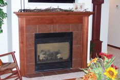 Standard Brown Maple Surround- Stained. Parade Home Wausau Wisconsin. 1 small