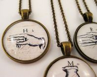 Sign Language Glass Pendant On Bronze Rolo Necklace 1 small