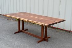 Seven Foot Live Edge Walnut Dining Table With Nakashima Style Base 1 small