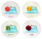 Blue Clutch Purse With A Red Flower Accent 1 small