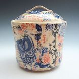 Stoneware Canister With Multi-Colored Patterns 1 small