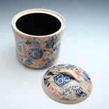 Stoneware Canister With Multi-Colored Patterns 4 small