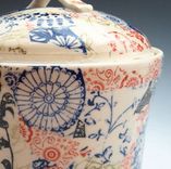 Stoneware Canister With Multi-Colored Patterns 5 small