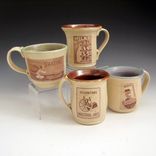 Pottery Mug In Cream And Burgundy With Wpa Posters 1 small